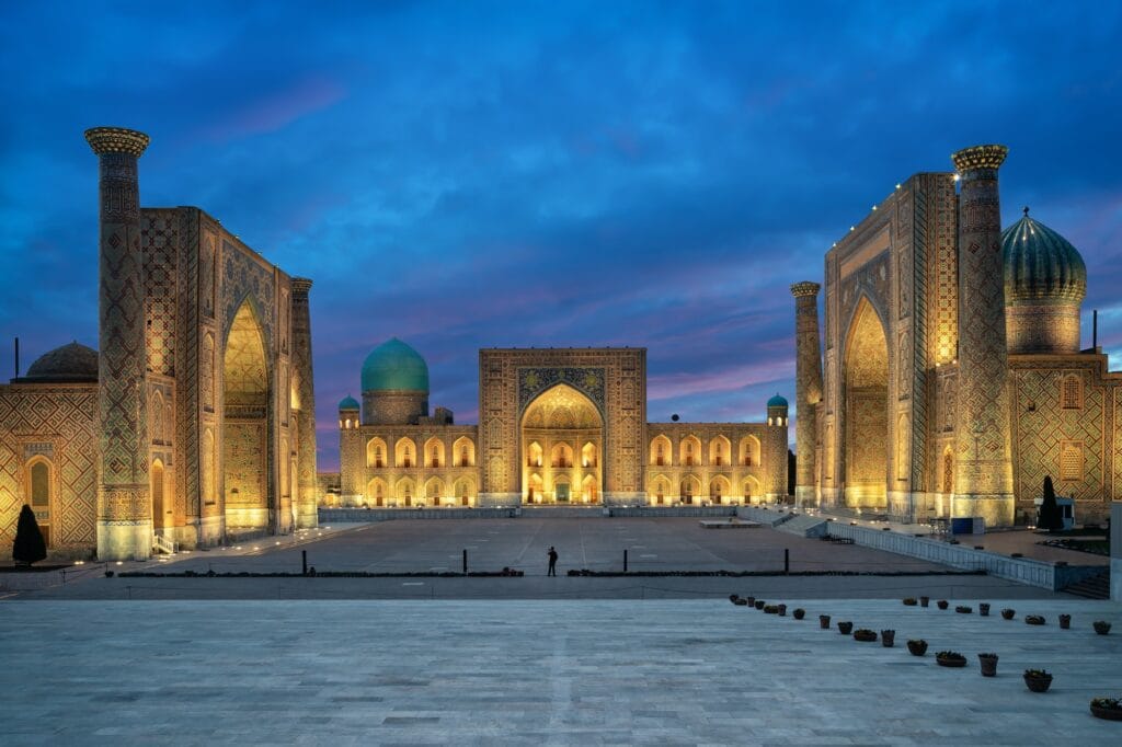 registan square at dusk in samarkand uzbekistan